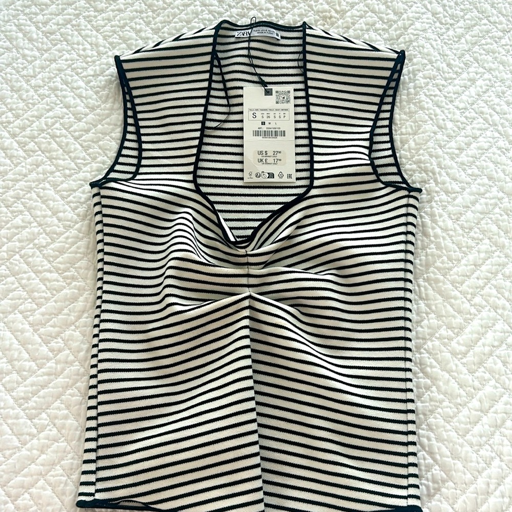 Brand new! Black and white striped v neck top
